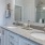 a bathroom with a large mirror