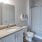a bathroom with a sink and a shower curtain