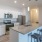 a kitchen with white cabinets