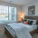 a bedroom with a large window