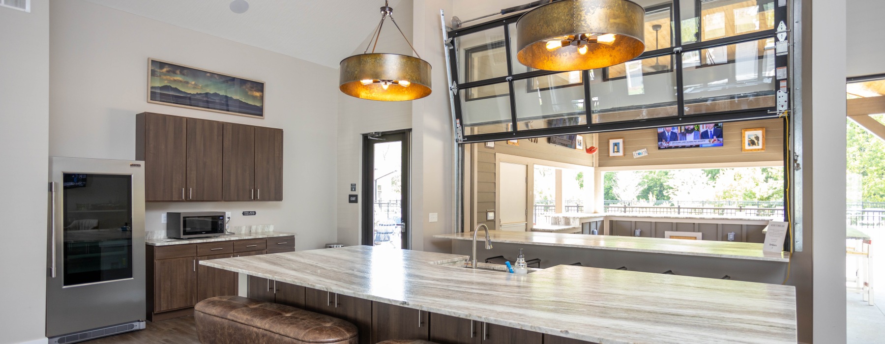 Large kitchen with round chandeliers