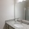 a bathroom with a large mirror